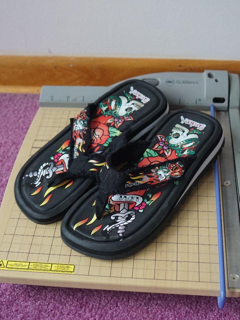 Ed Hardy x Skechers sandals